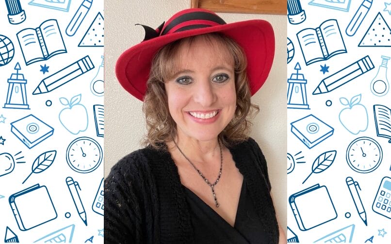 Teacher wearing a red hat